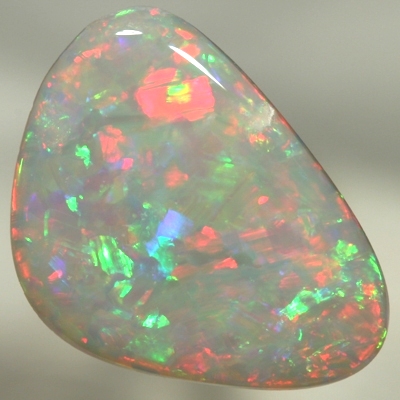 SOLID SEMI BLACK OPAL Sparkling bright red and green jumping over each other